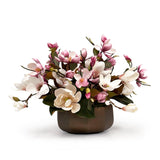 Artificial tree magnolia arrangement in a bronze pot on a white background