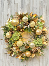 beautiful pre-lit and pre-decorated luxury ornament wreath for the holidays