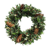 Hand-crafted pointed holly wreath with variegated green foliage, accented by berries and pinecones for a festive display against a white background