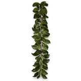 Realistic faux magnolia leaf garland with lush green foliage for mantels staircases and seasonal décor