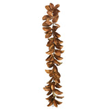 luxury faux magnolia leaf garland in bronze gold
