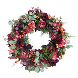 faux eucalyptus wreath with ranunculus and poppy