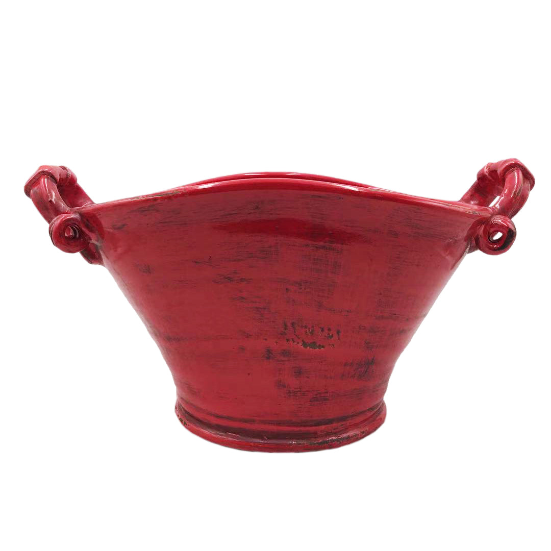 red potter's handled planter