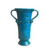 23-inch teal blue terracotta vase with two decorative handles, featuring a rustic finish, perfect for use as a statement piece or a large planter for indoor to outdoor decor.
