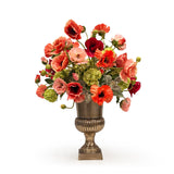 Poppy floral arrangement in a decorative container on a white background