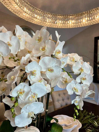 close-up detail shot of high quality faux white orchids from Winward Home