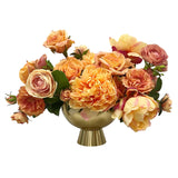 High-quality luxury faux rose peony in a golden pot featuring orange and yellow roses, ranunculus, and peony flowers placed against white background