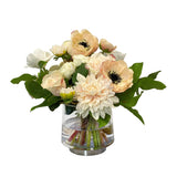 Real Touch dahlia and anemone faux floral arrangement in clear glass vase with blush-neutral blooms