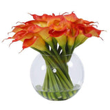 Luxury faux burnt orange calla lily arrangement in a clear glass bowl vase