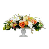 Luxury mixed floral arrangement in decorative compotier with peonies roses orchids and greenery for elegant foyer and home décor