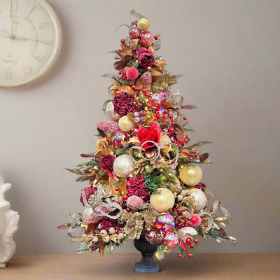 Red and gold pre-decorated Christmas tabletop tree