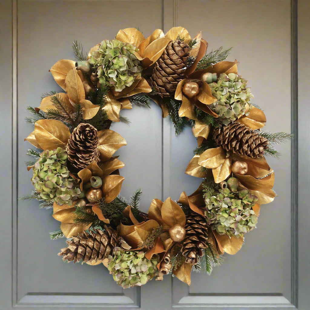 luxury faux green and gold pre-decorated holiday wreath shown on front door