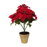 Hand-crafted poinsettia plant with red flowers and green leaves in a pot, displayed against a white background