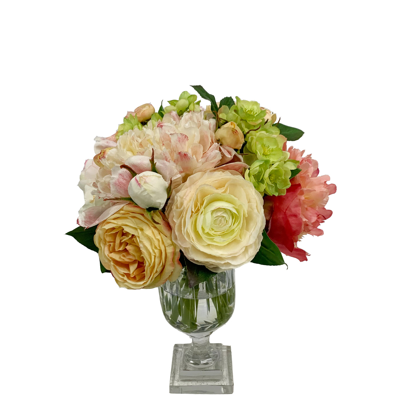 Mixed roses and peonies in clear glass urn
