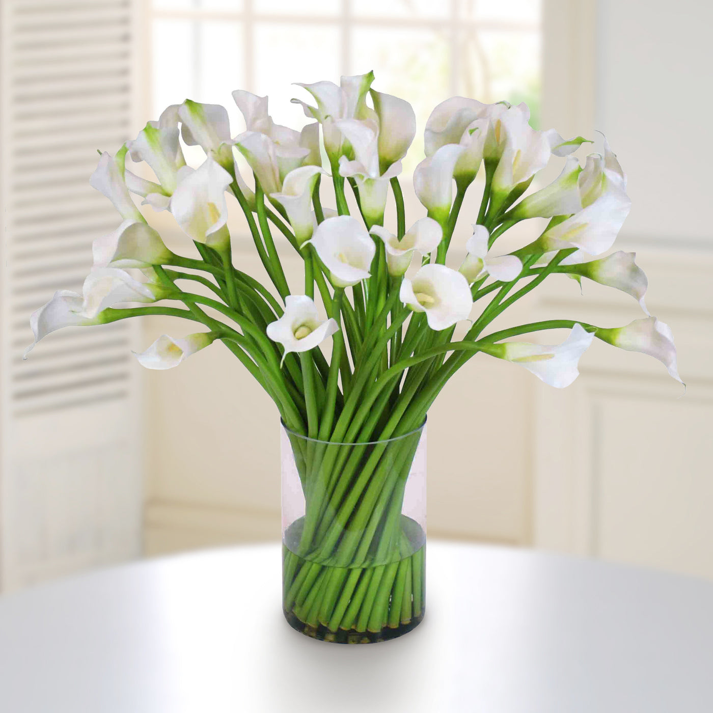 CALLA LILY IN CLEAR CYLINDER VASE (WHD083-WW) - Winward Home faux floral arrangements