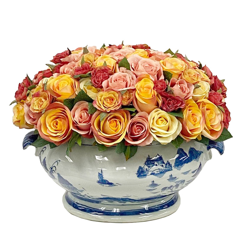 mixed color roses in white and blue ceramic container