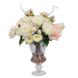 Real Touch rose mix floral arrangement with cream white champagne and blush blooms displayed in an elevated clear glass vase.