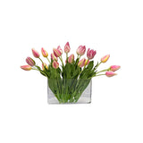 Elegant faux mixed tulip arrangement in pink and mauve tones displayed in a modern rectangular glass vase