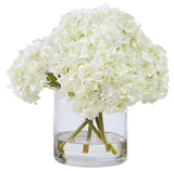 Luxury faux white hydrangea arrangement in a clear glass vase