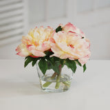 Luxury faux peach peony arrangement in a clear glass vase with soft realistic blooms