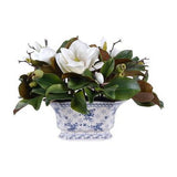 Faux magnolia in white and blue pot