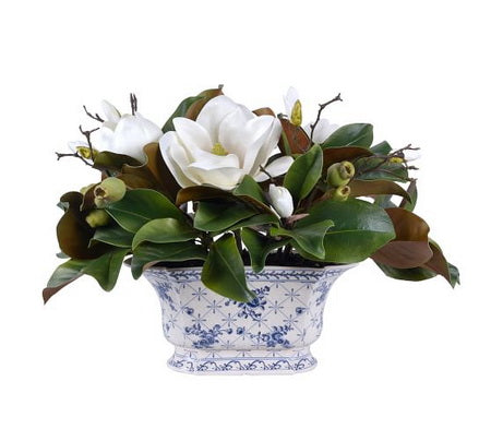 Faux magnolia in white and blue pot